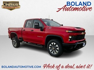 Custom image overlays for Boland Chevrolet in Bowling Green, MO, showcasing vehicle features and limited-time offers.